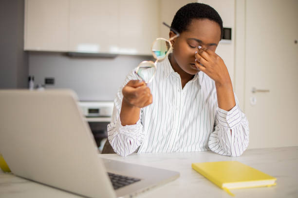 How to Reduce Eye Strain from Screen Time in 2025 happy young woman is enjoying working from home